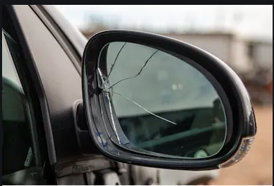Broken Mirror in Retnal Car